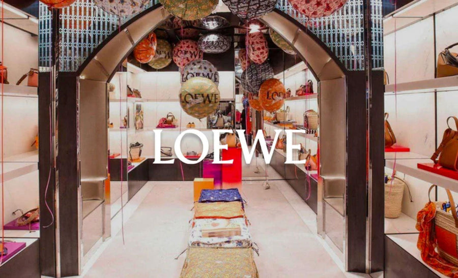 Loewe Paula's Ibiza launch at the MARAIS women's boutique, with bags on shelves and hanging lanterns