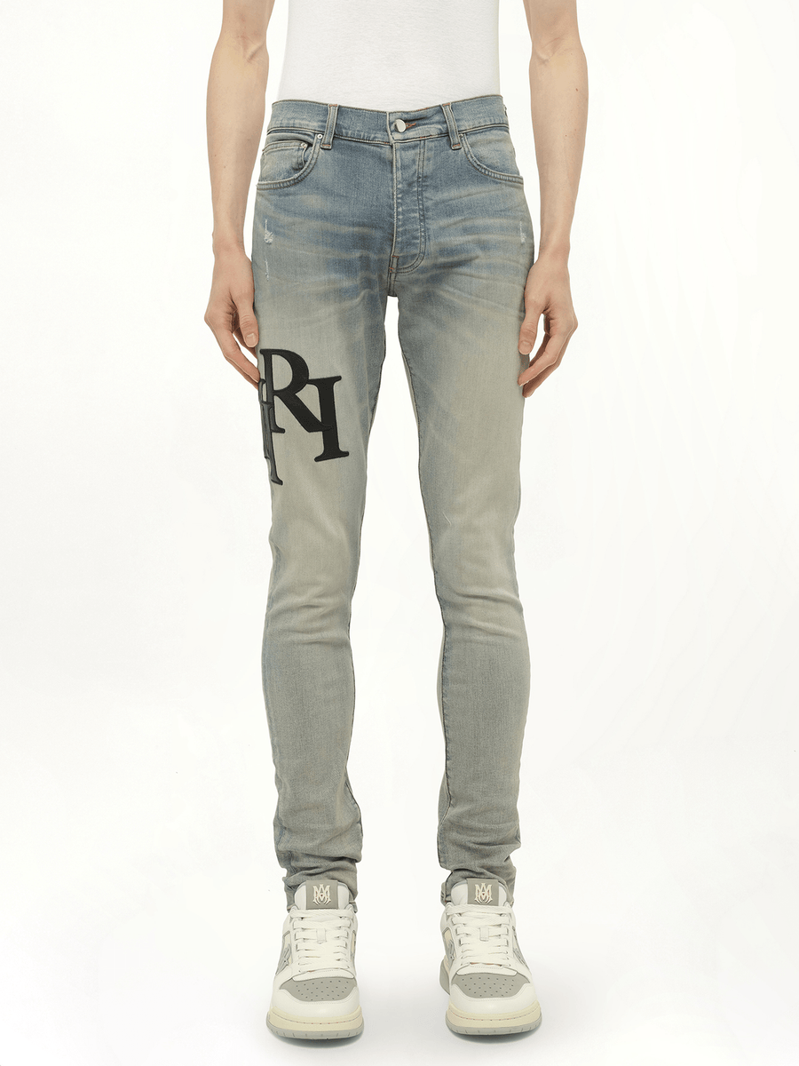 Staggered Logo Skinny Jeans in Antique Indigo/Black