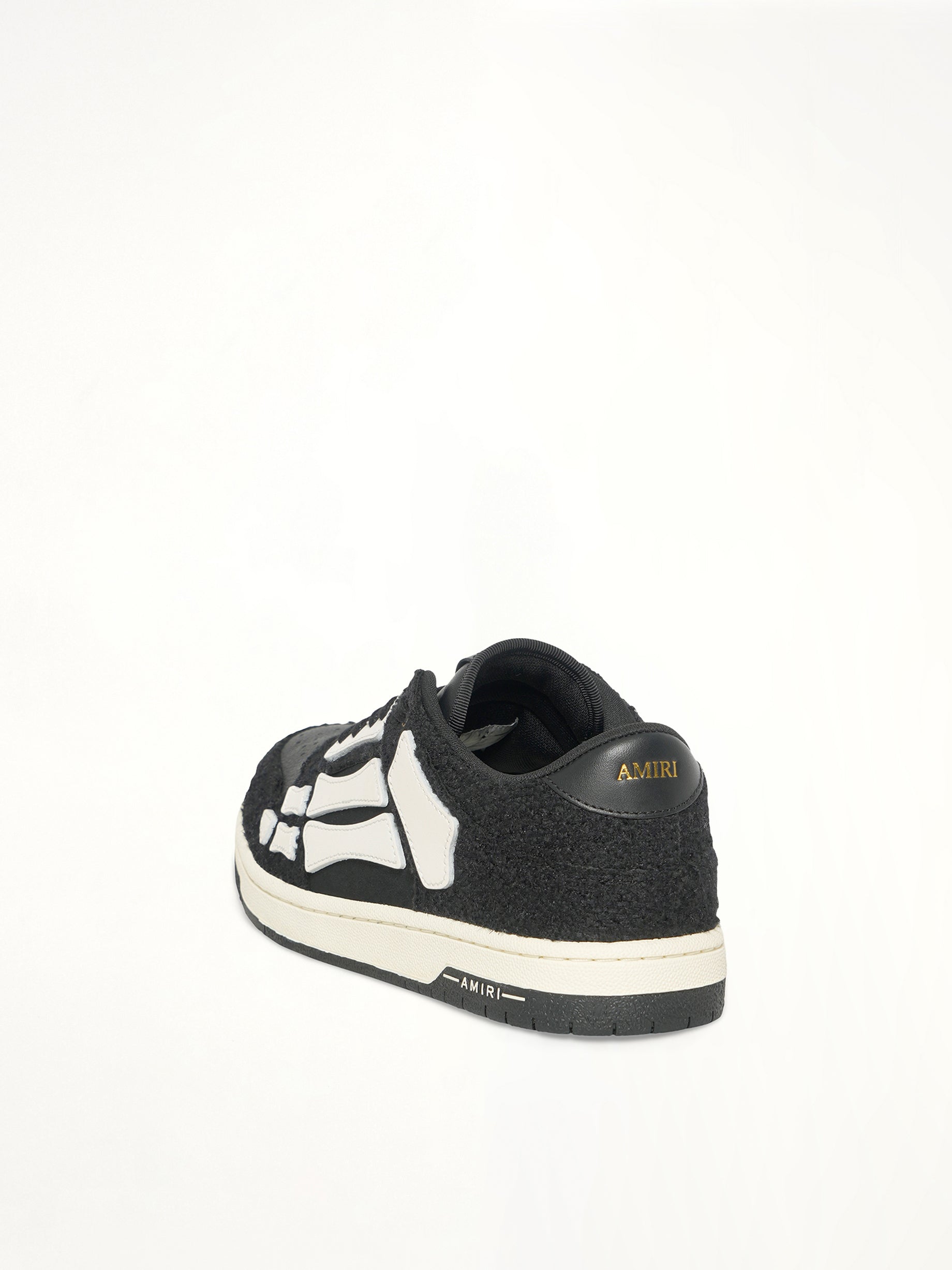 Boucle Skeleton Low Top Sneaker in Black Back View | AMIRI