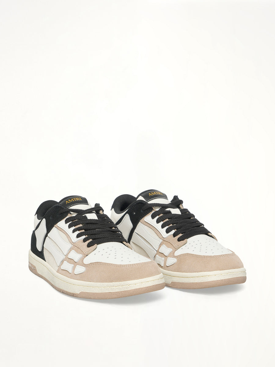 Distressed Skeleton Low Top Sneaker in Black Front View | AMIRI