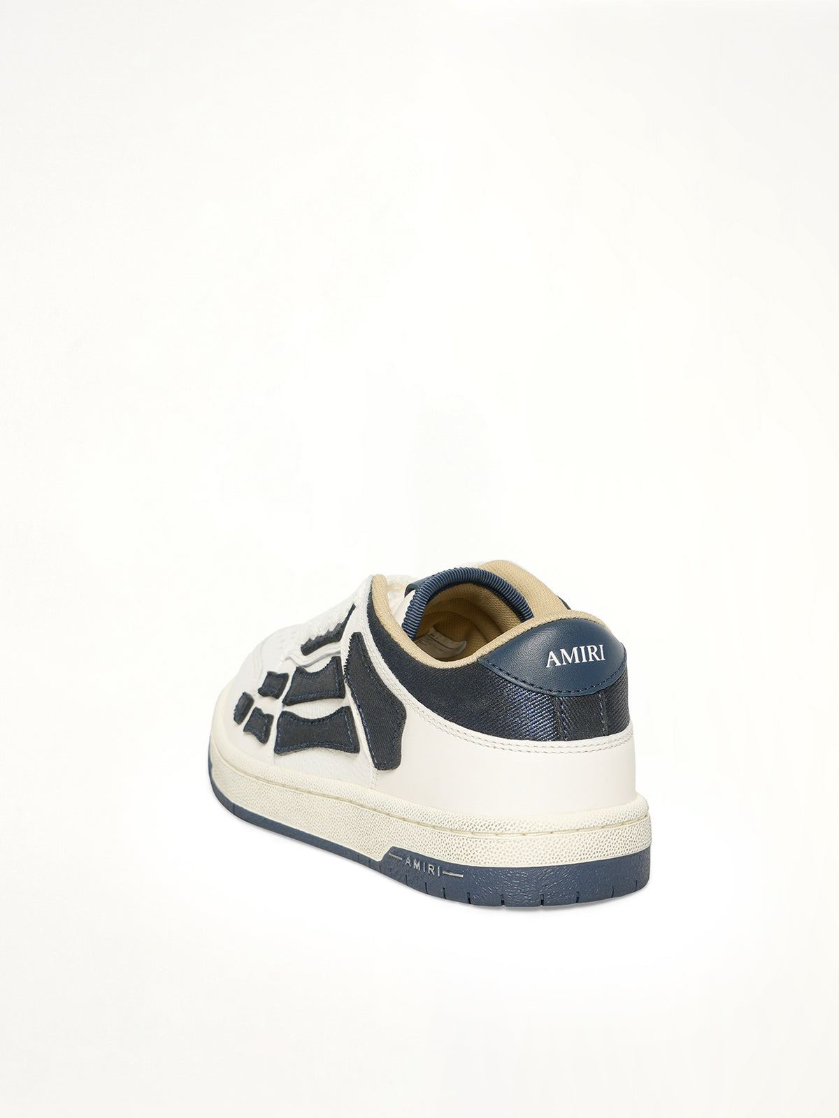 Denim Skeleton Low Top Sneakers in Wet Shimmer Back View | AMIRI