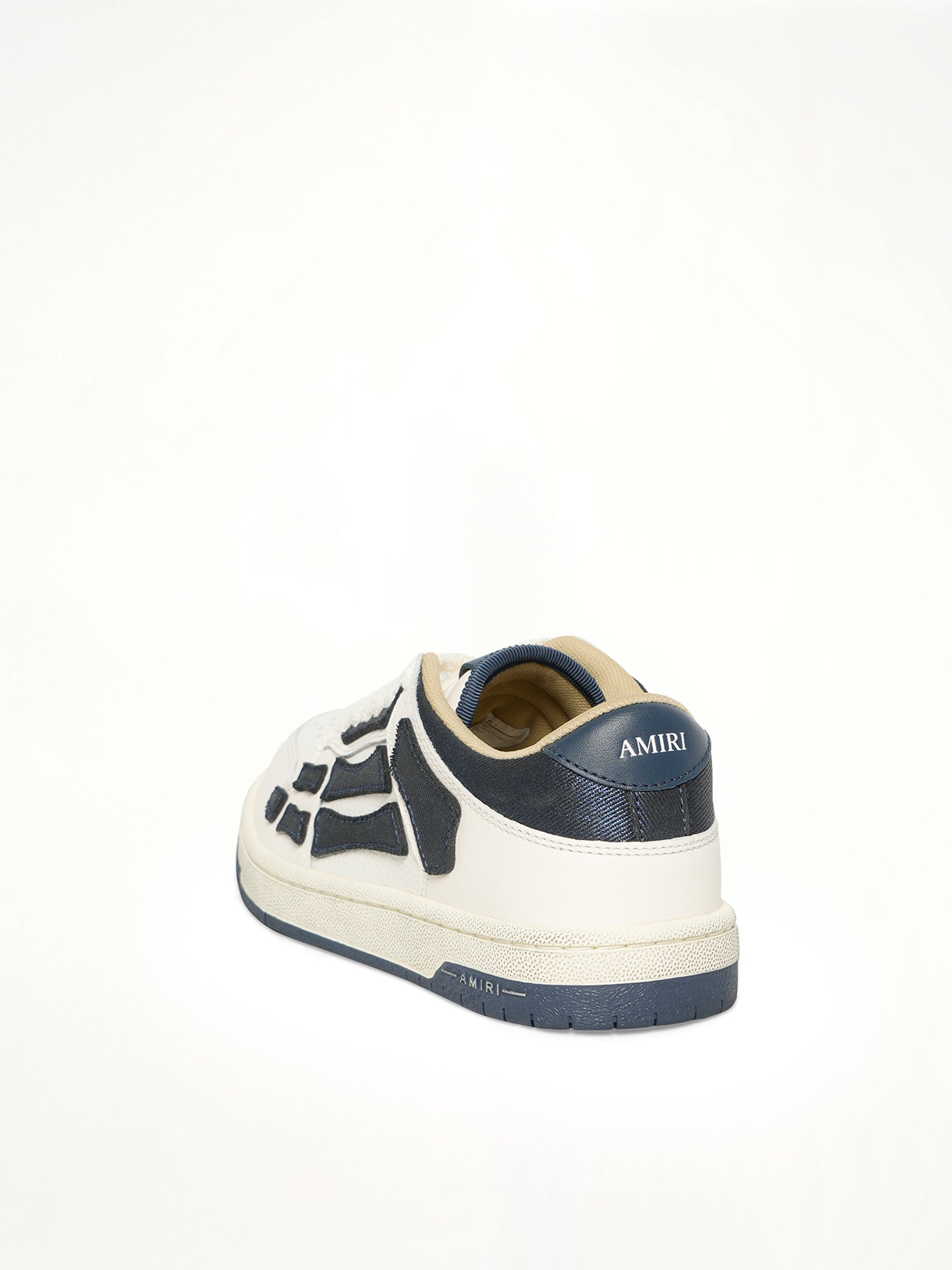 Denim Skeleton Low Top Sneakers in Wet Shimmer Back View | AMIRI