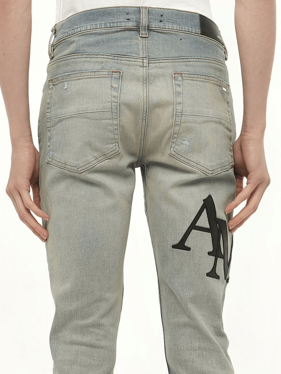 Staggered Logo Skinny Jeans in Antique Indigo/Black