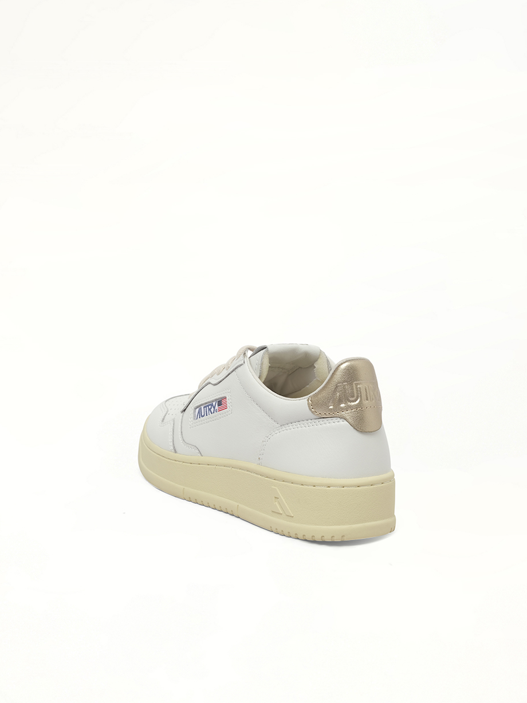 Medalist Low Sneakers in White/Gold Top View | AUTRY