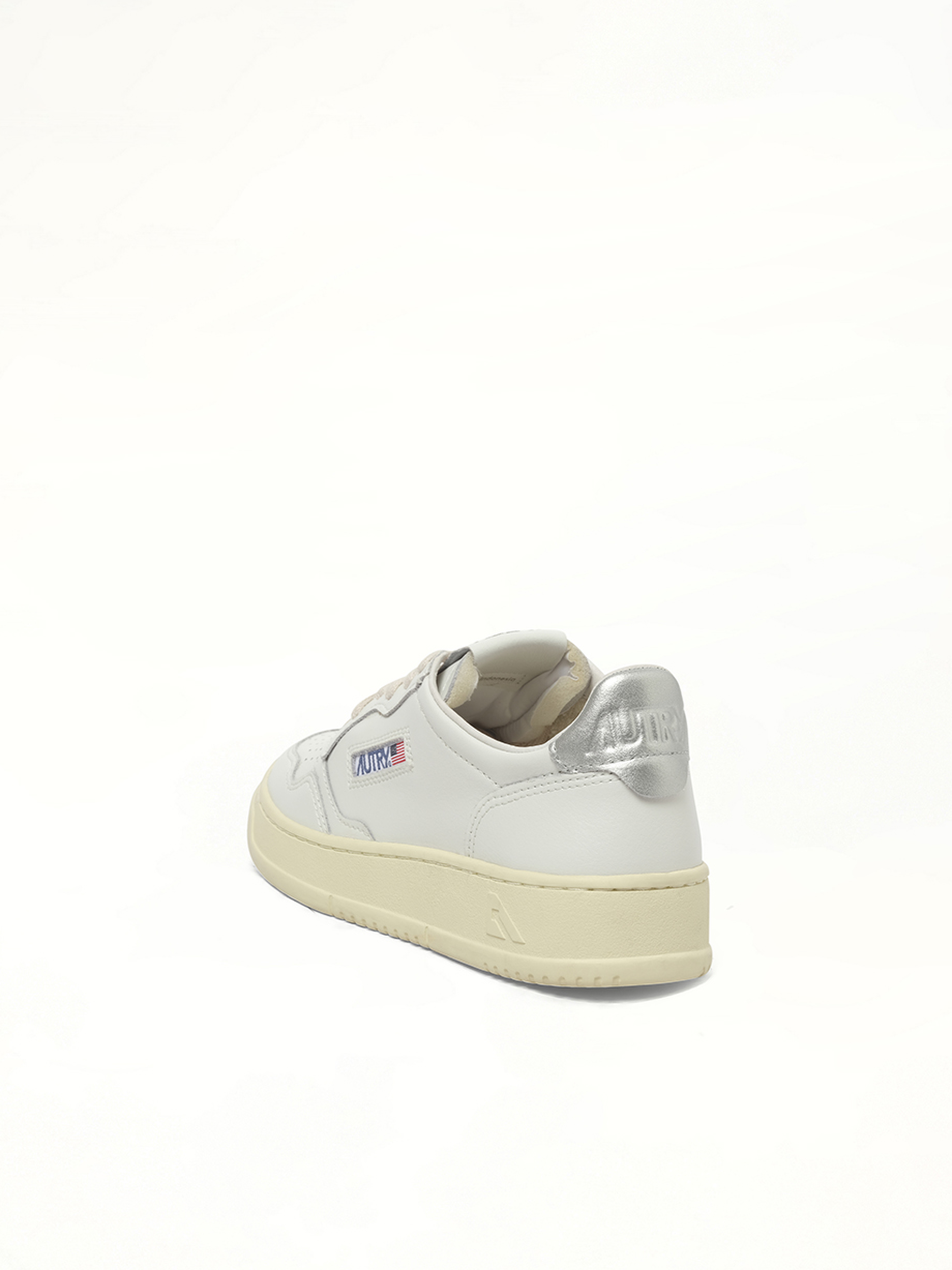 Medalist Low Sneakers in White/Silver Top View | AUTRY