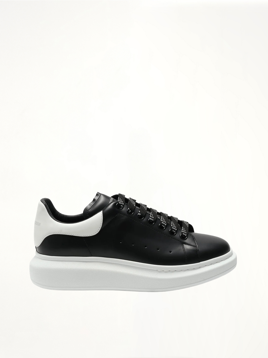 Larry Oversized Sneaker in Black/White Side View | ALEXANDER MCQUEEN