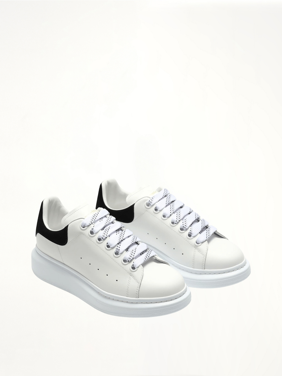 Larry Oversized Suede Sneakers in White/Black Front View | ALEXANDER MCQUEEN