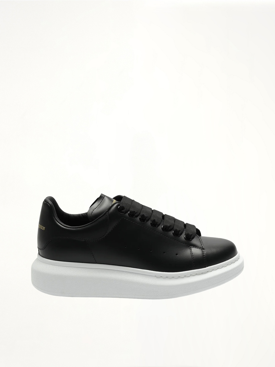 Larry Oversized Sneakers in Black/White Side View | ALEXANDER MCQUEEN