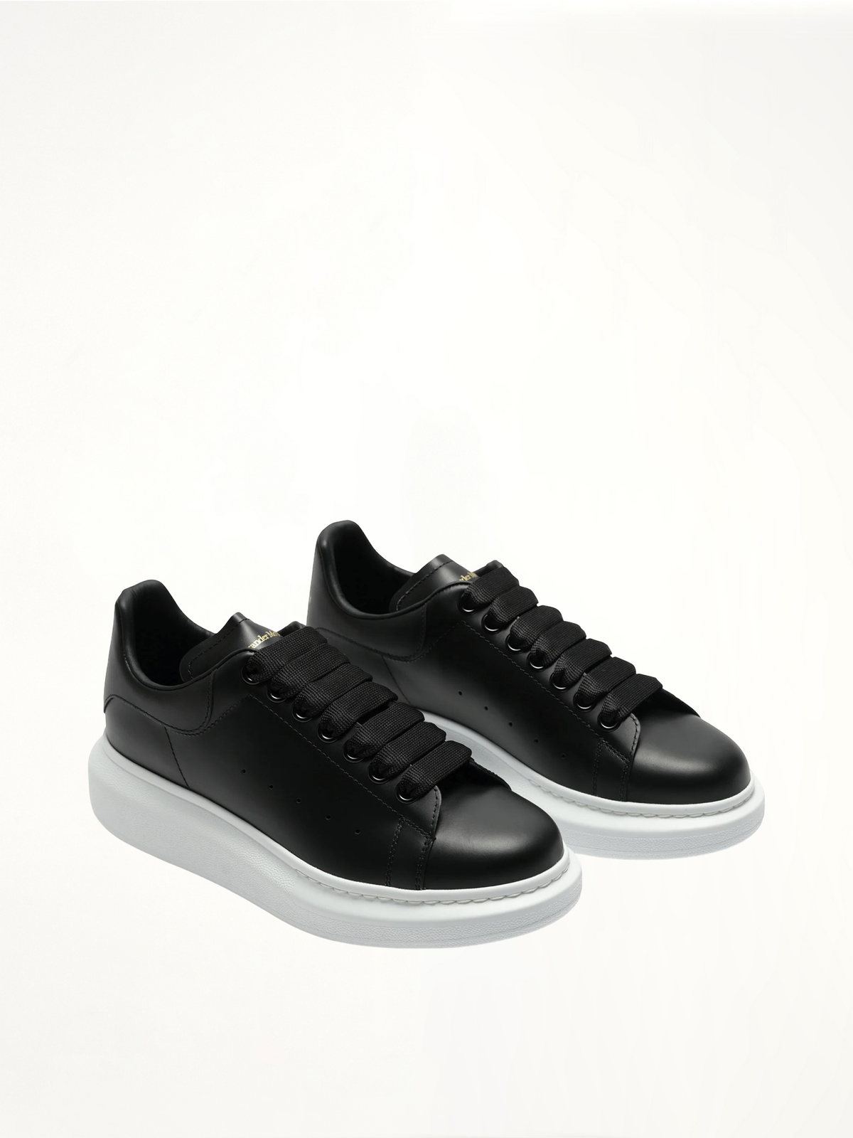 Larry Oversized Sneakers in Black/White Front View | ALEXANDER MCQUEEN