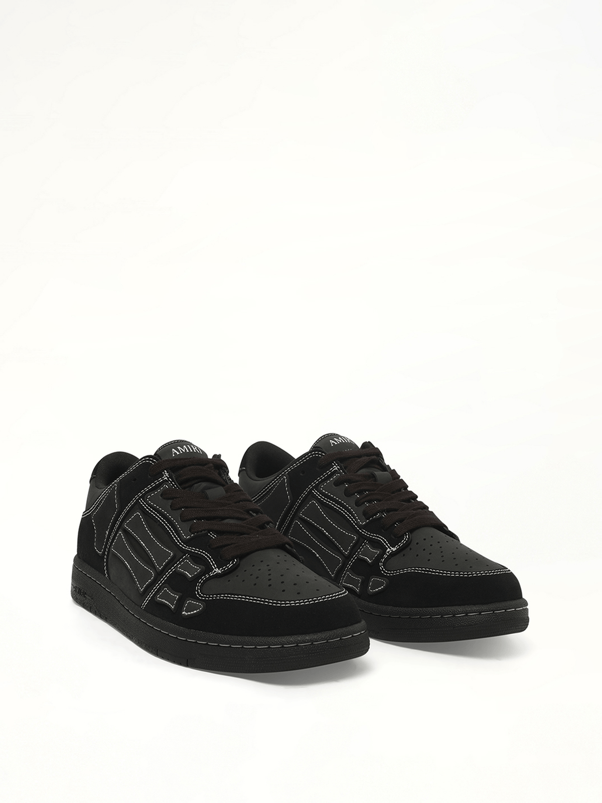 Skeleton Top Low Sneaker in Black Front View | AMIRI
