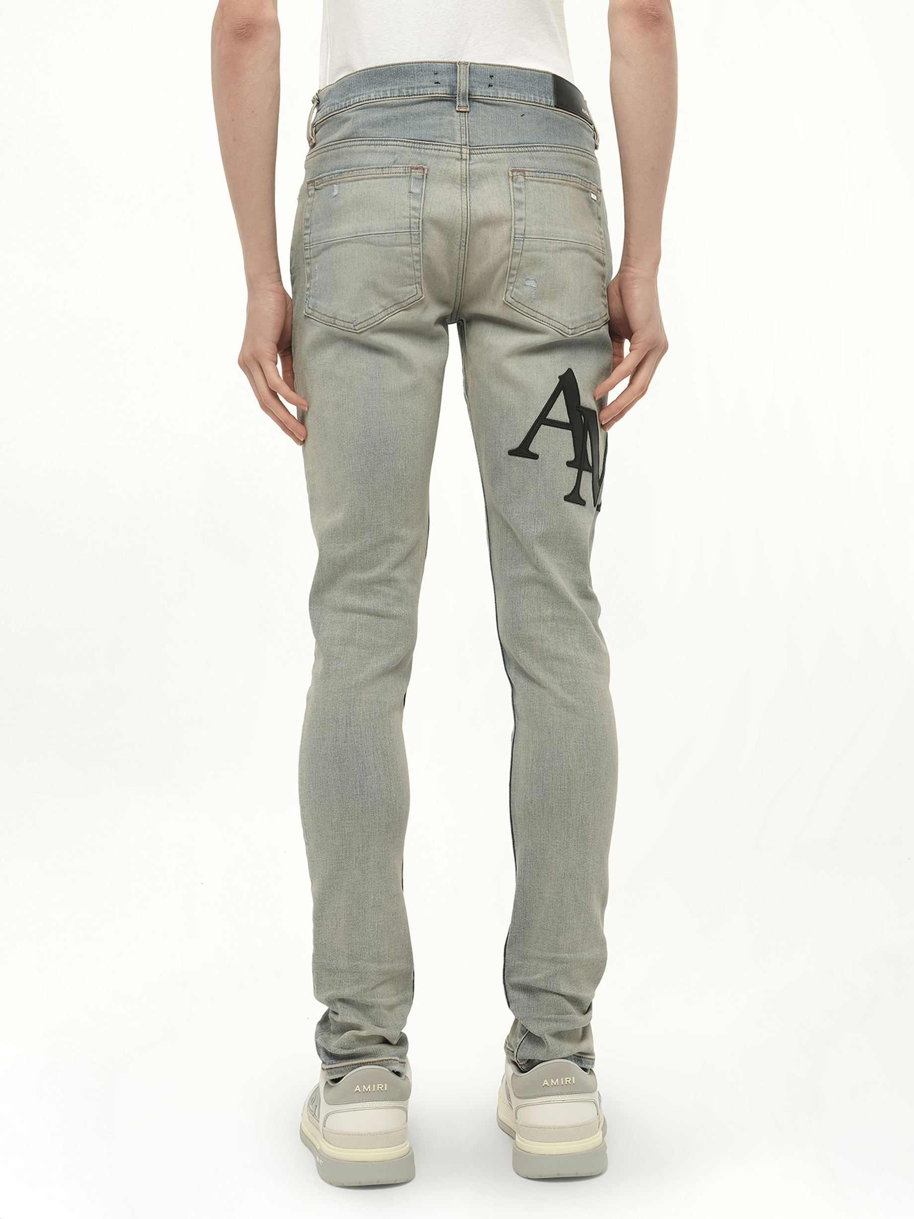 Staggered Logo Skinny Jeans in Antique Indigo/Black