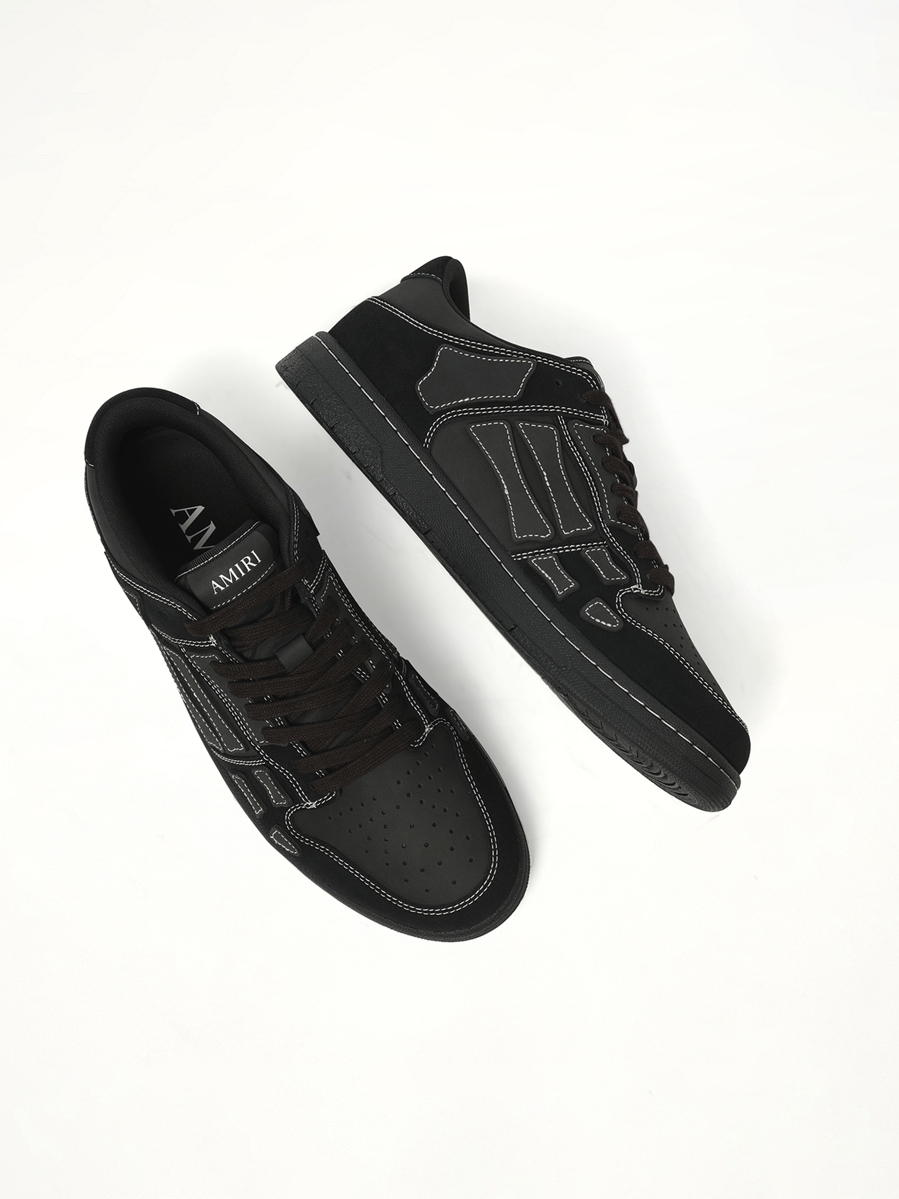 Skeleton Top Low Sneaker in Black Back View | AMIRI