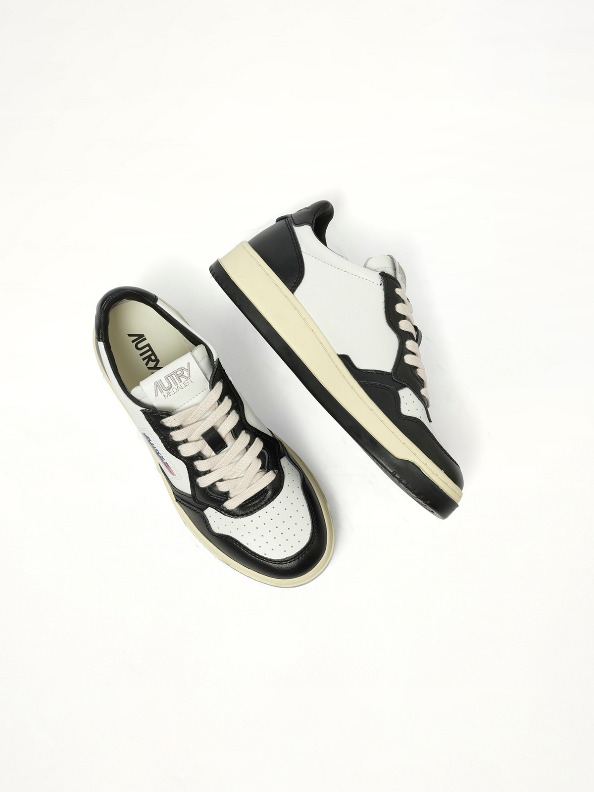 Medalist Low Bicolour Sneakers in White/Black Back View | AUTRY