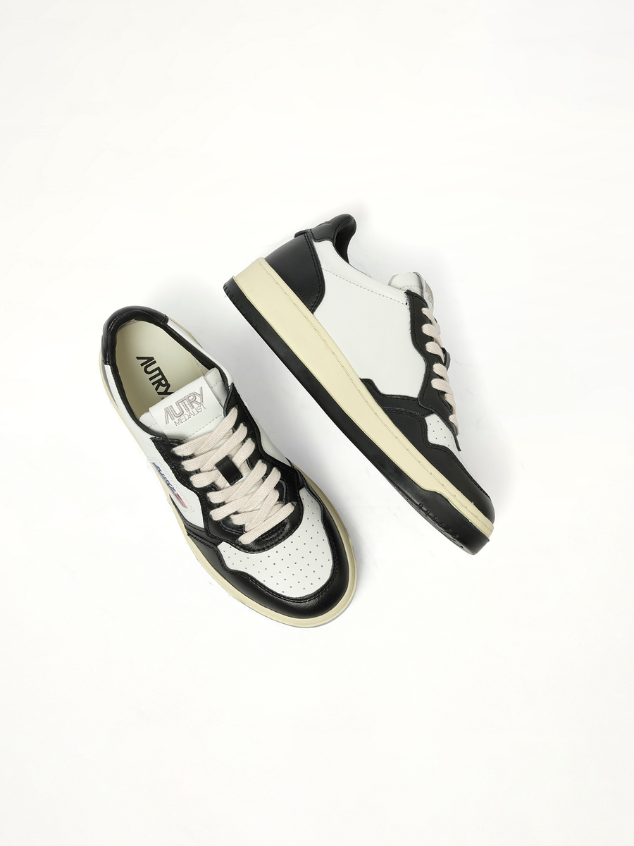 Medalist Low Bicolour Sneakers in White/Black Back View | AUTRY