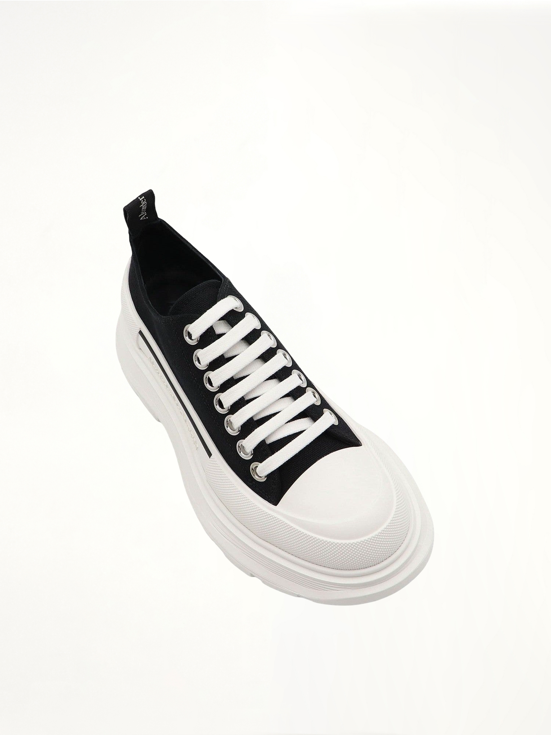 Tread Slick Canvas Lace-Up Shoes in Black/White Top View | ALEXANDER MCQUEEN