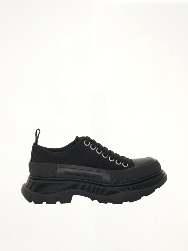 Tread Slick Canvas Lace-Up Shoes in Black Side View | ALEXANDER MCQUEEN