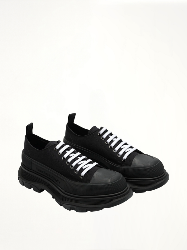 Tread Slick Canvas Lace-Up Shoes in Black Front View | ALEXANDER MCQUEEN