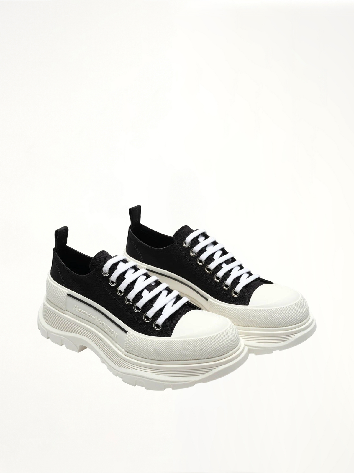 Tread Slick Canvas Lace-Up Shoes in Black/White Front View | ALEXANDER MCQUEEN