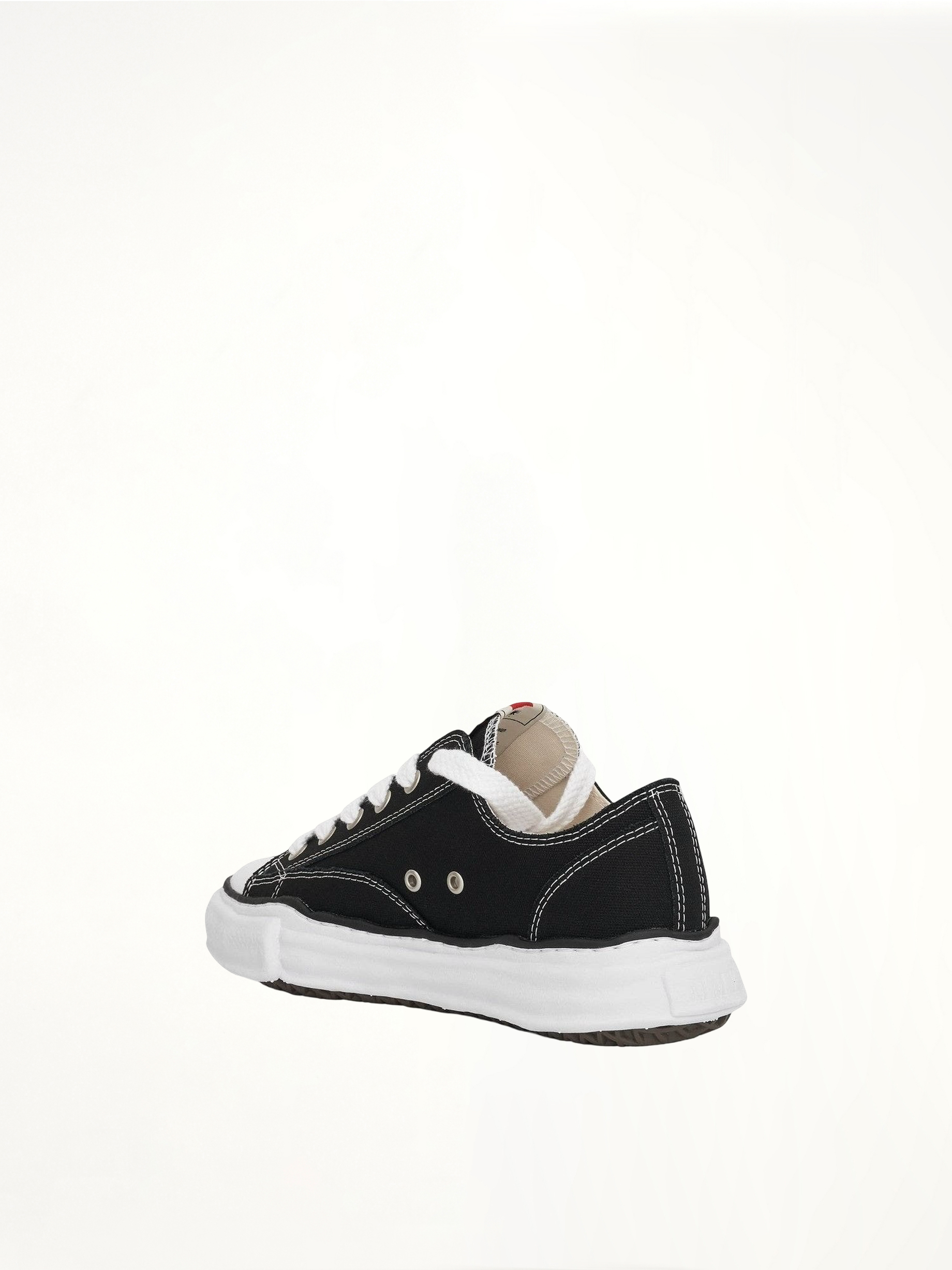 Peterson OG Sneaker in Black/White Back View | MAISON MIHARA YASUHIRO
