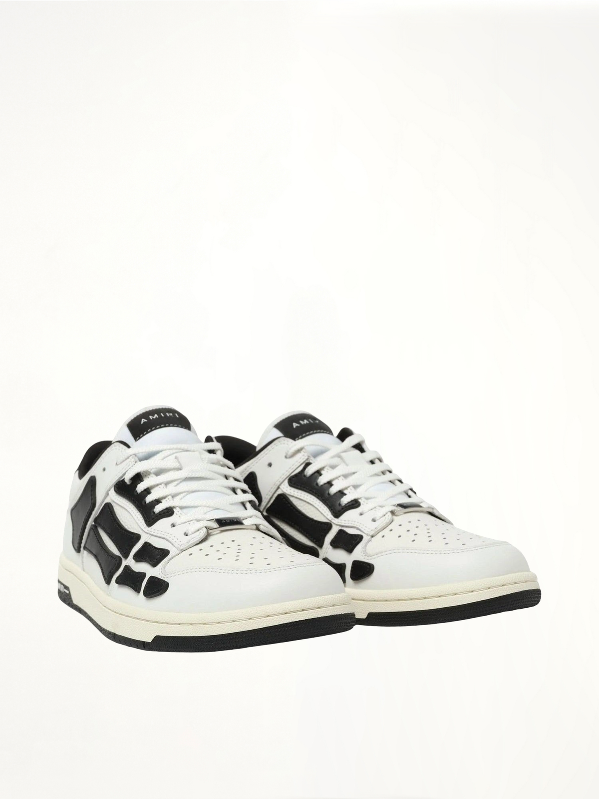 Skeleton Low Sneaker in White/Black Front View | AMIRI