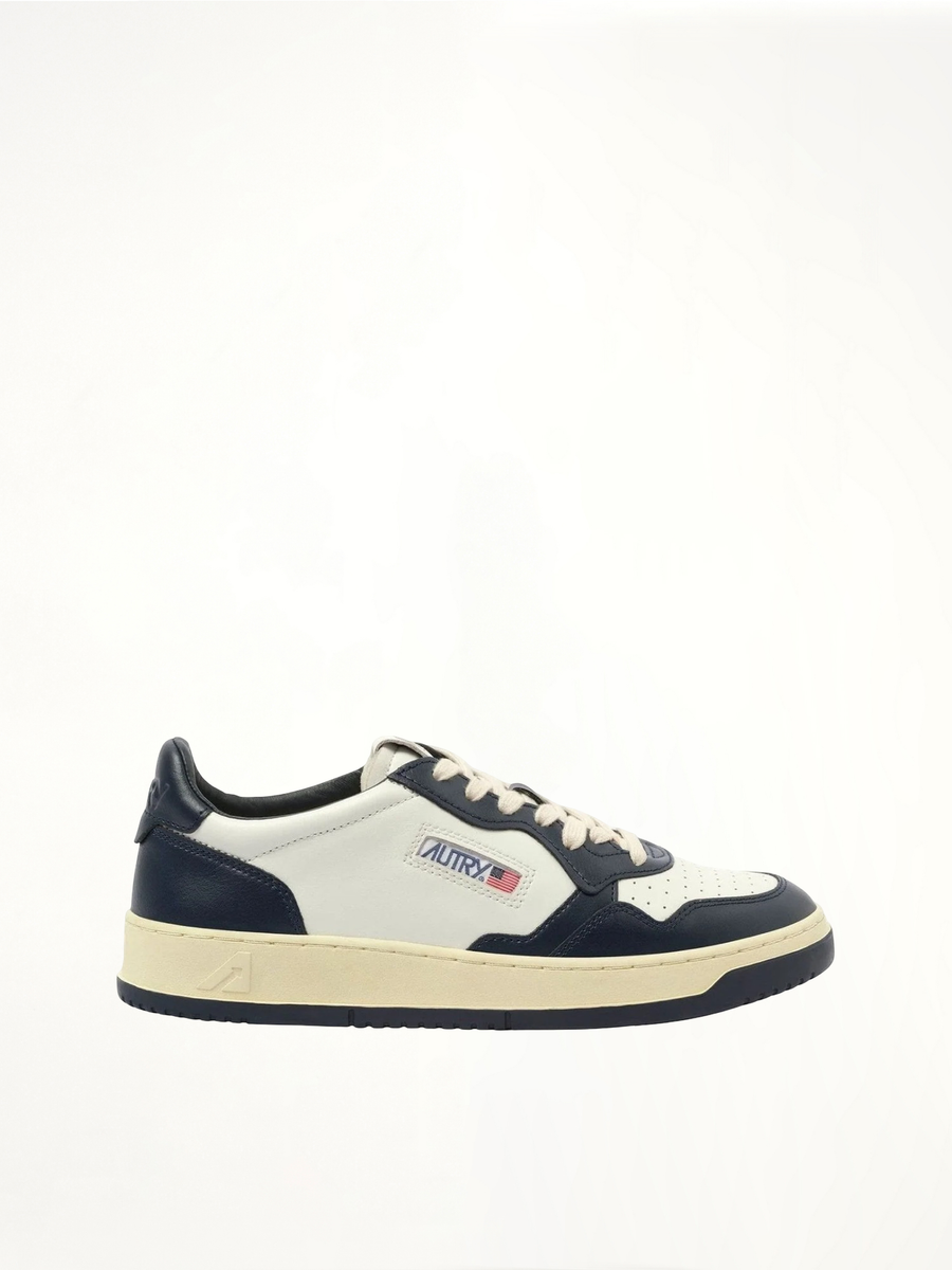 Medalist Low Bicolour Sneakers in White/Blue Side View | AUTRY
