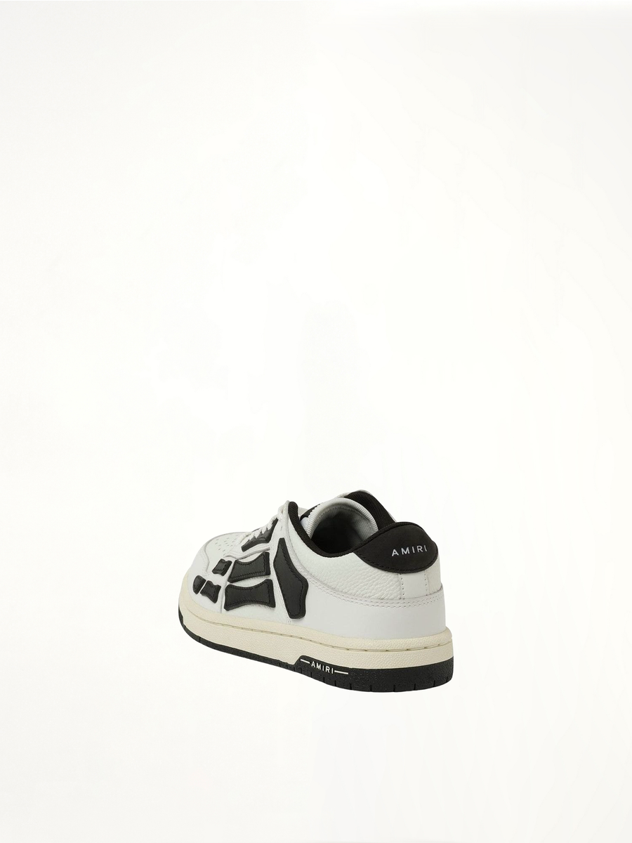 Skeleton Low Top Sneaker in White/Black Back View | AMIRI