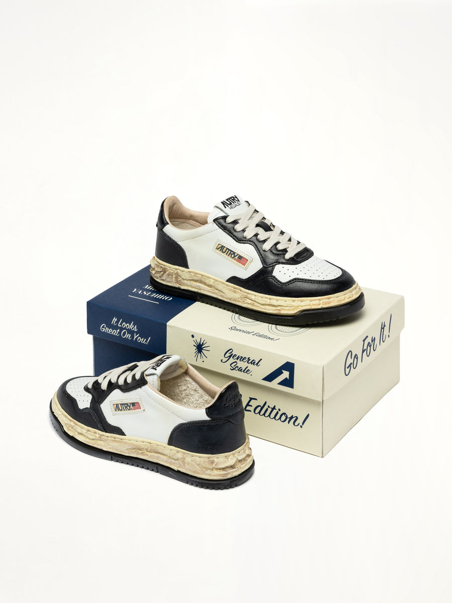 MMY Super Vintage Low Sneaker in White/Black Top View | AUTRY