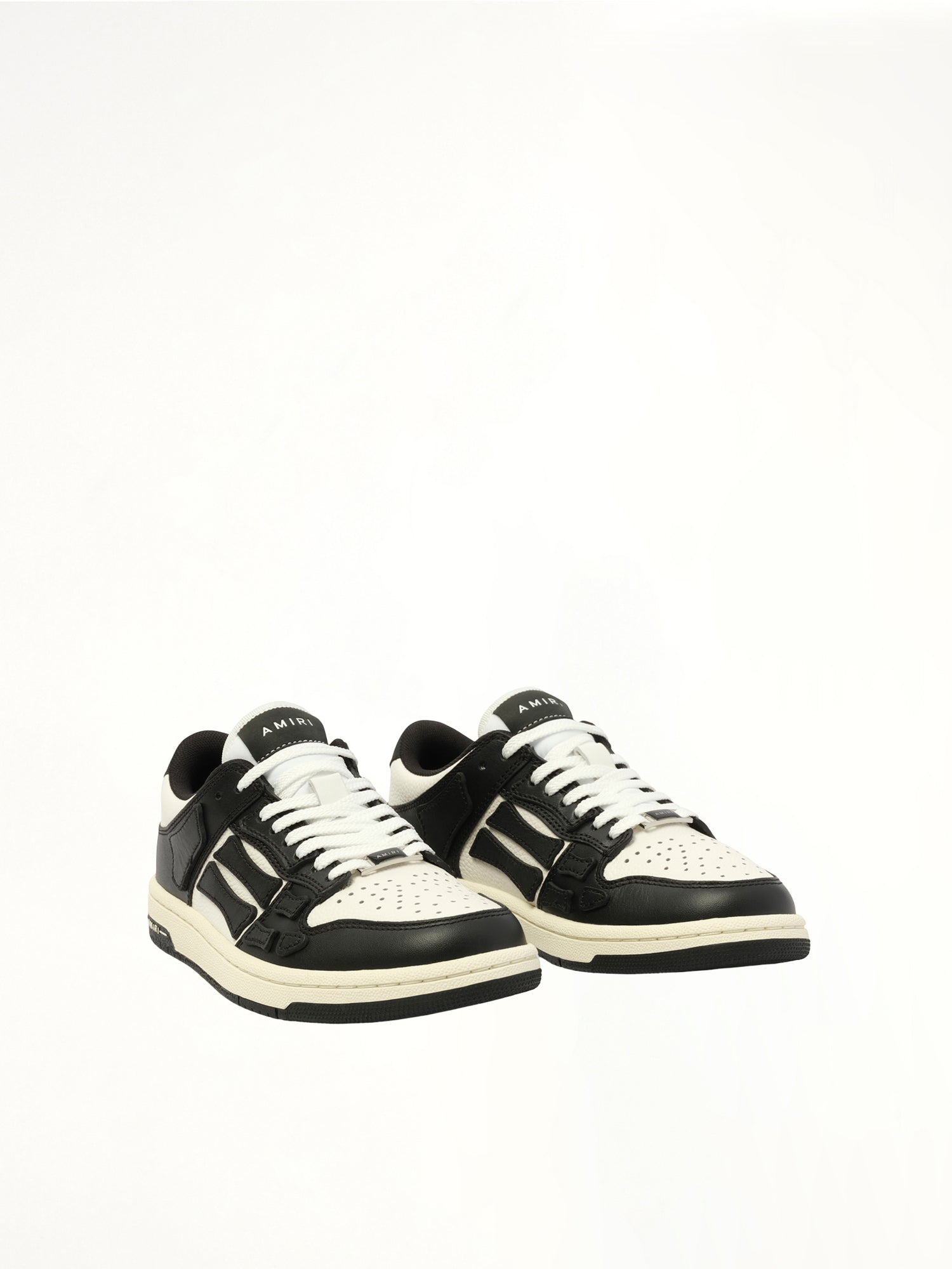 Skeleton Top Low Sneaker in Black/White Front View | AMIRI