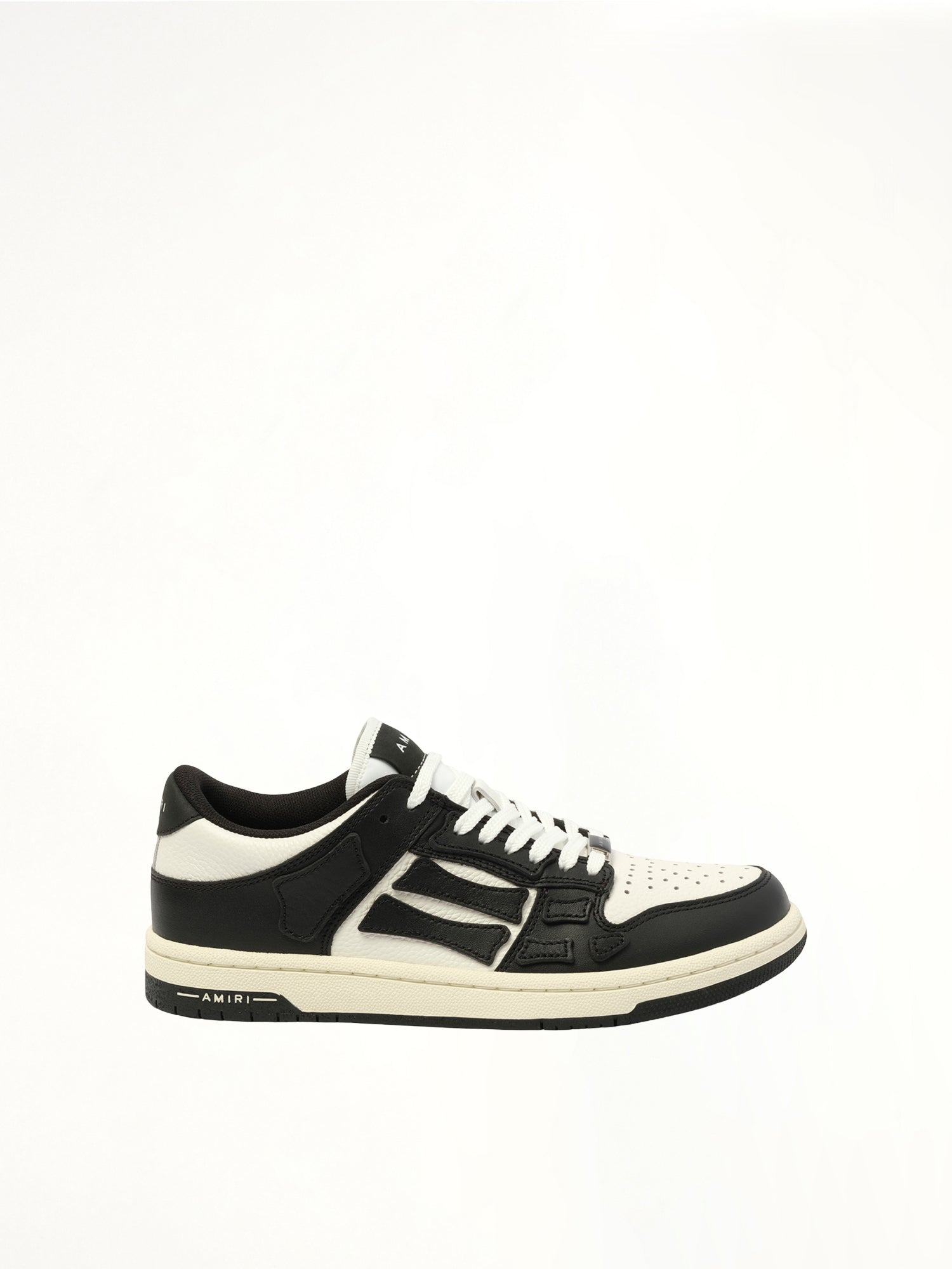 Skeleton Top Low Sneaker in Black/White Side View | AMIRI