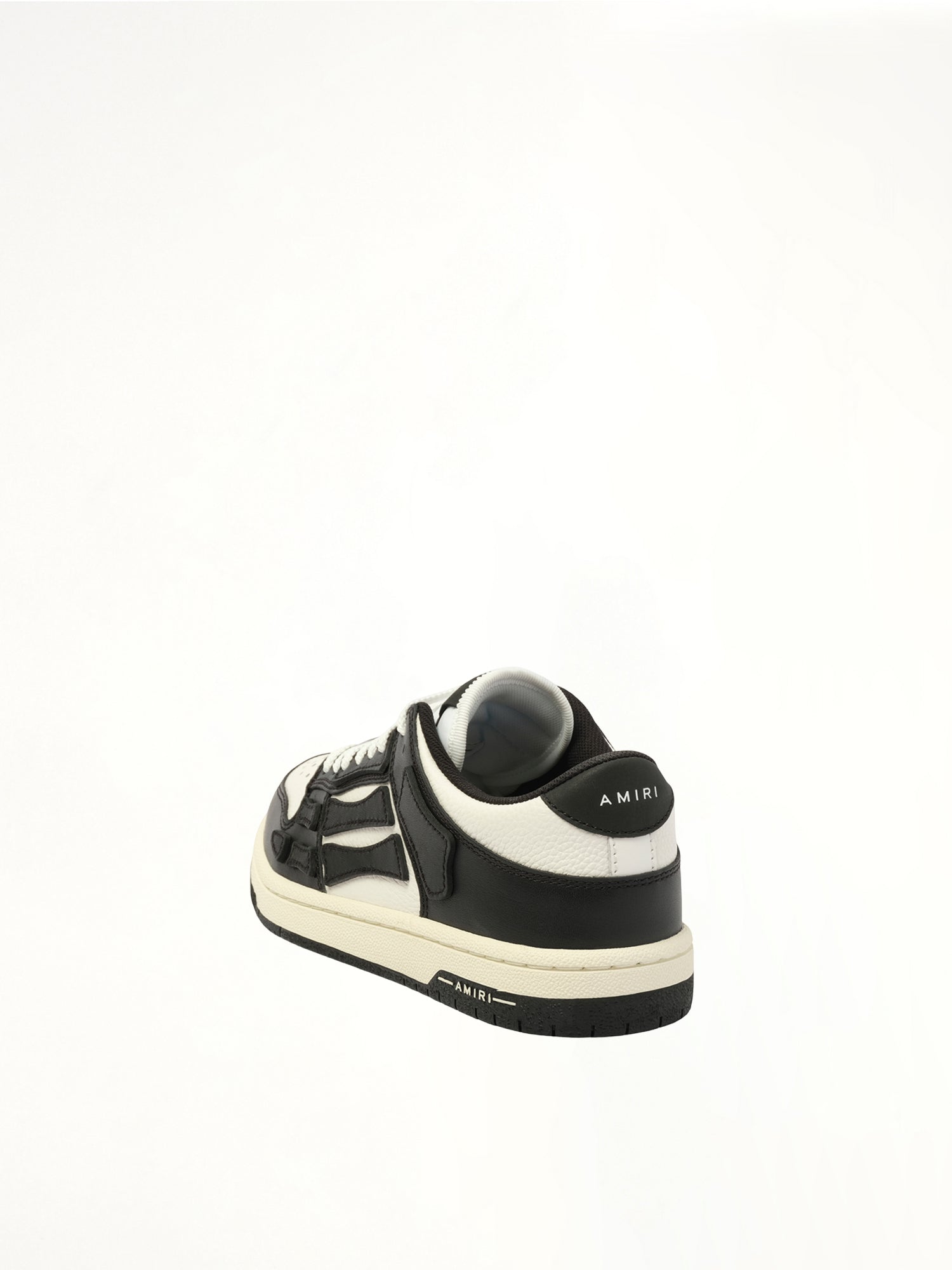 Skeleton Top Low Sneaker in Black/White Back View | AMIRI