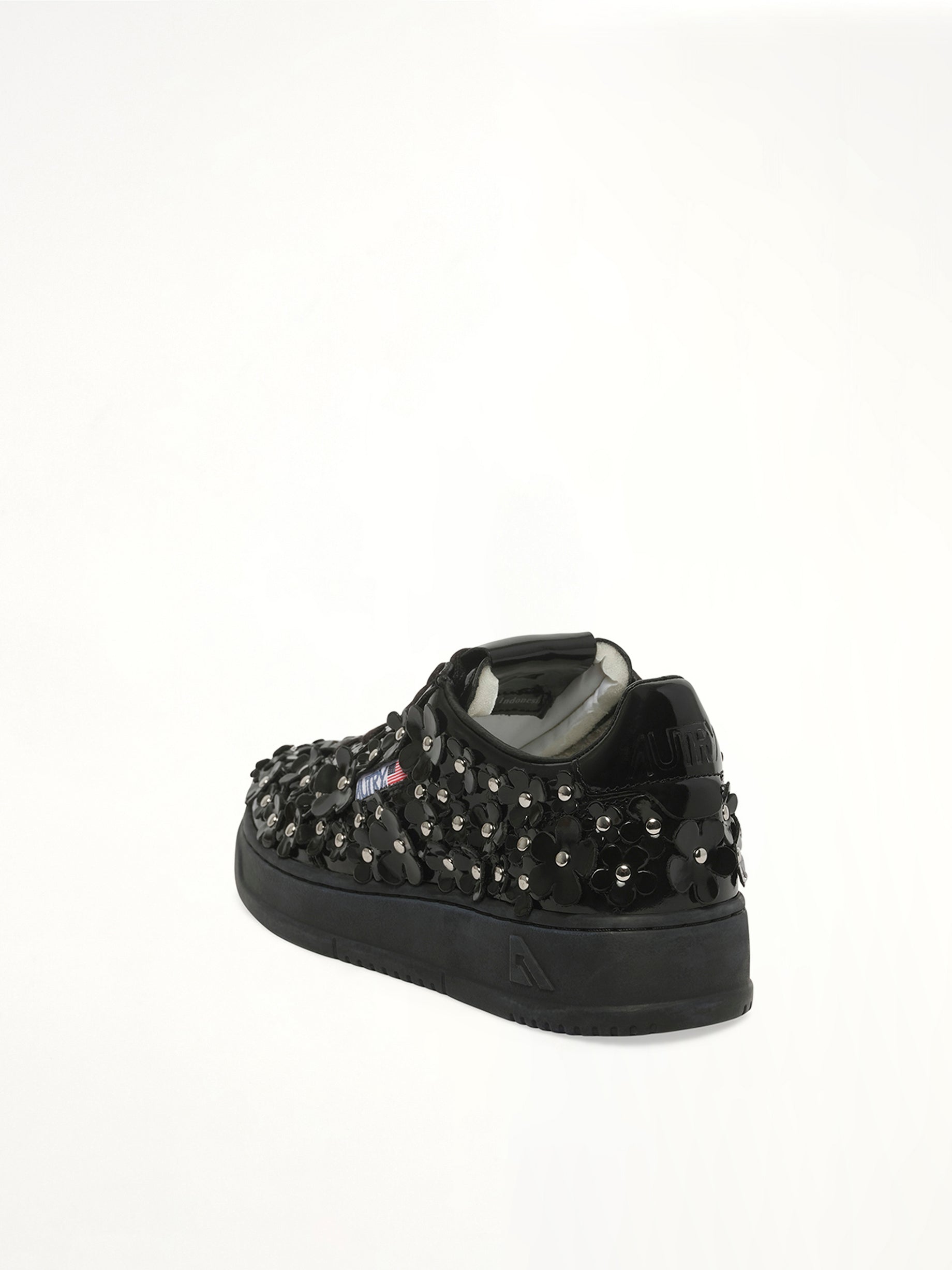 Medalist Low Patent Flower Sneaker in Black Back View | AUTRY