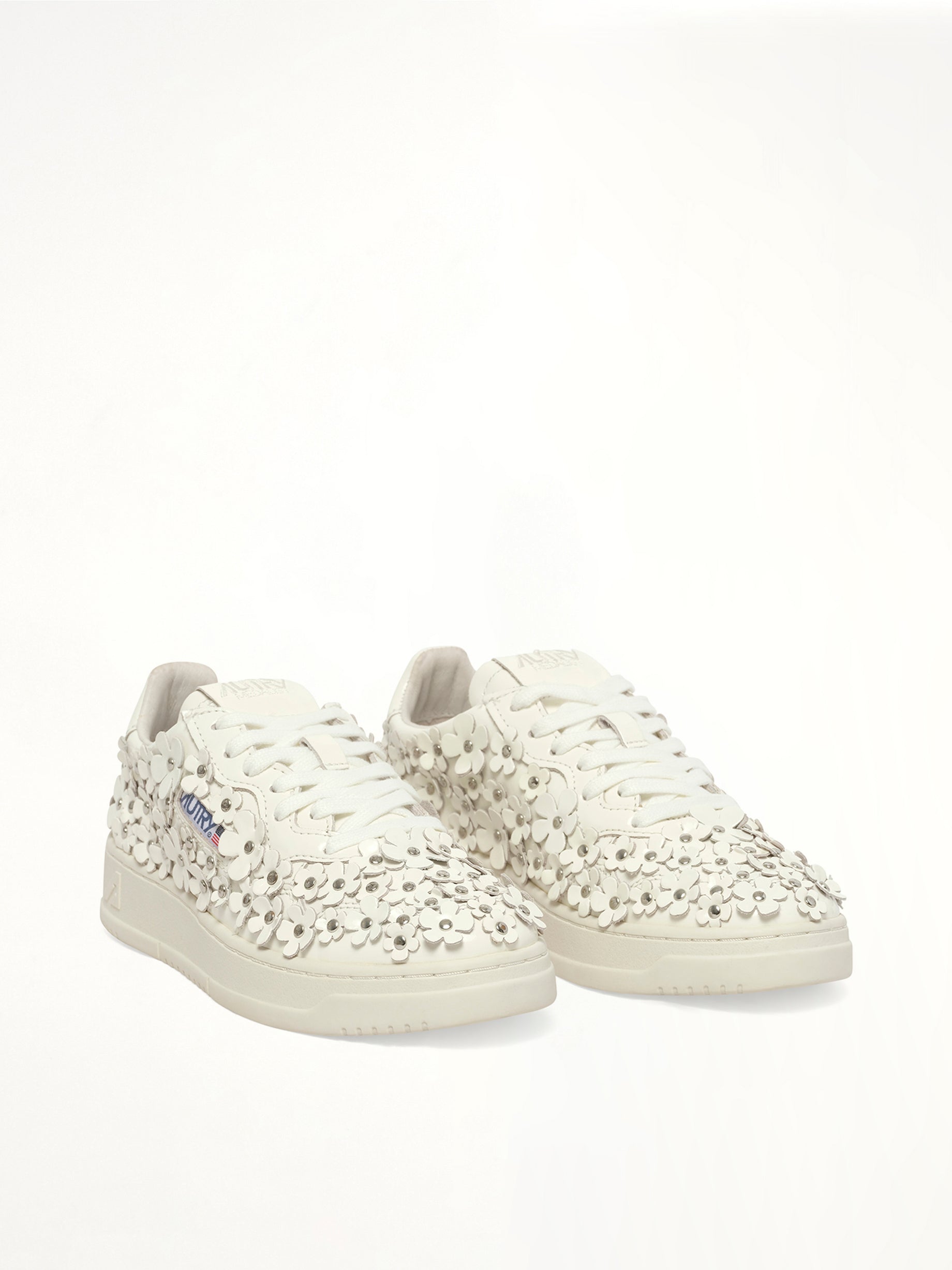 Medalist Low Patent Flower Sneaker in White Front View | AUTRY