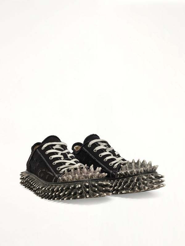 Dirty Spike Toe Cap Canvas Sneaker in Black Front View | DOUBLET