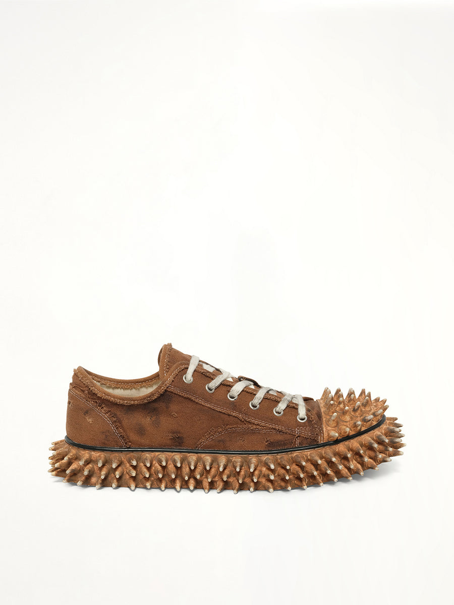 Dirty Spike Toe Cap Canvas Sneaker in Brown Side View | DOUBLET