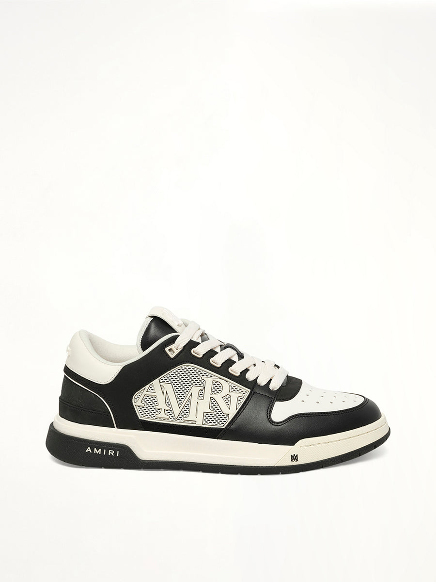 MA Quad Debossed Classic Low in Black Side View | AMIRI