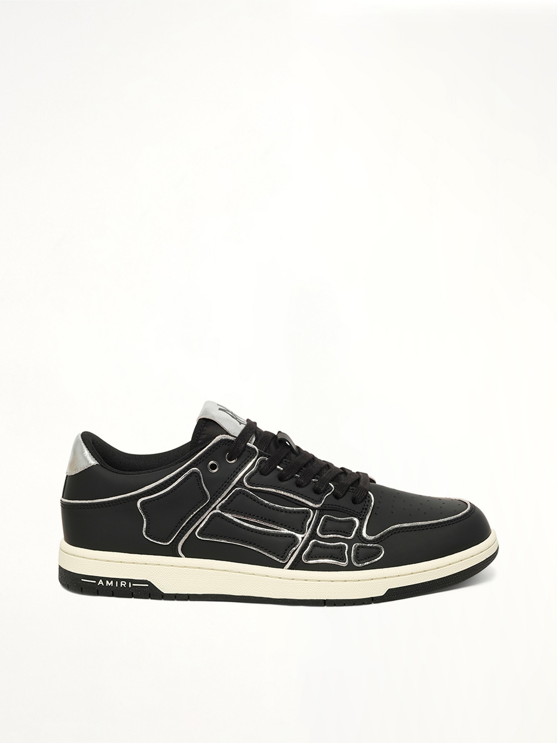 Skel Top Low Contrast Sneaker in Black Side View | AMIRI