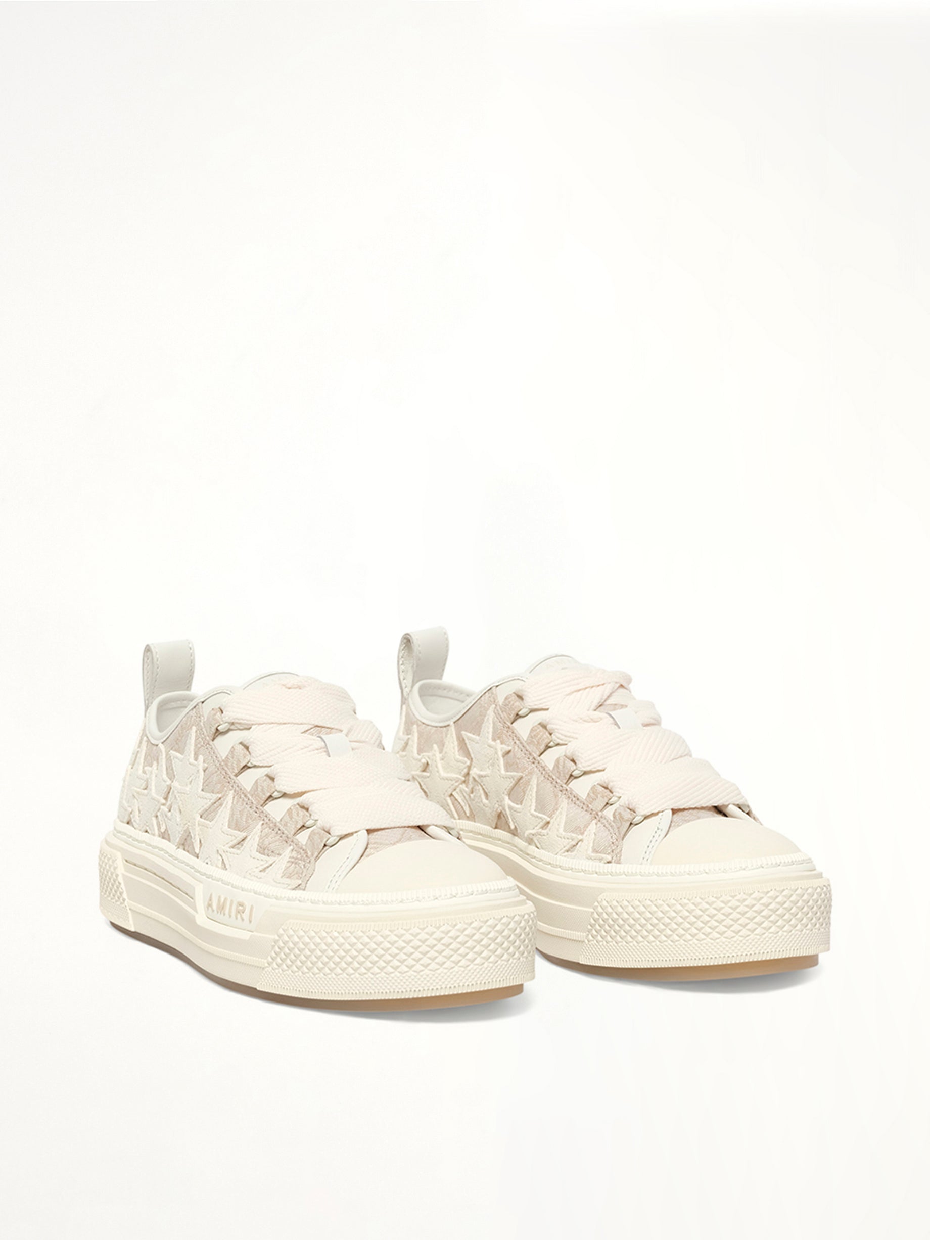 MA Quad Stars Court Low in Alabaster Front View | AMIRI