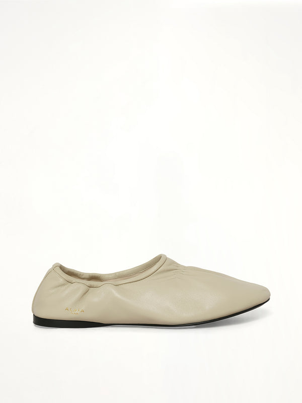 Supple Slippers in White Side View | ALAIA