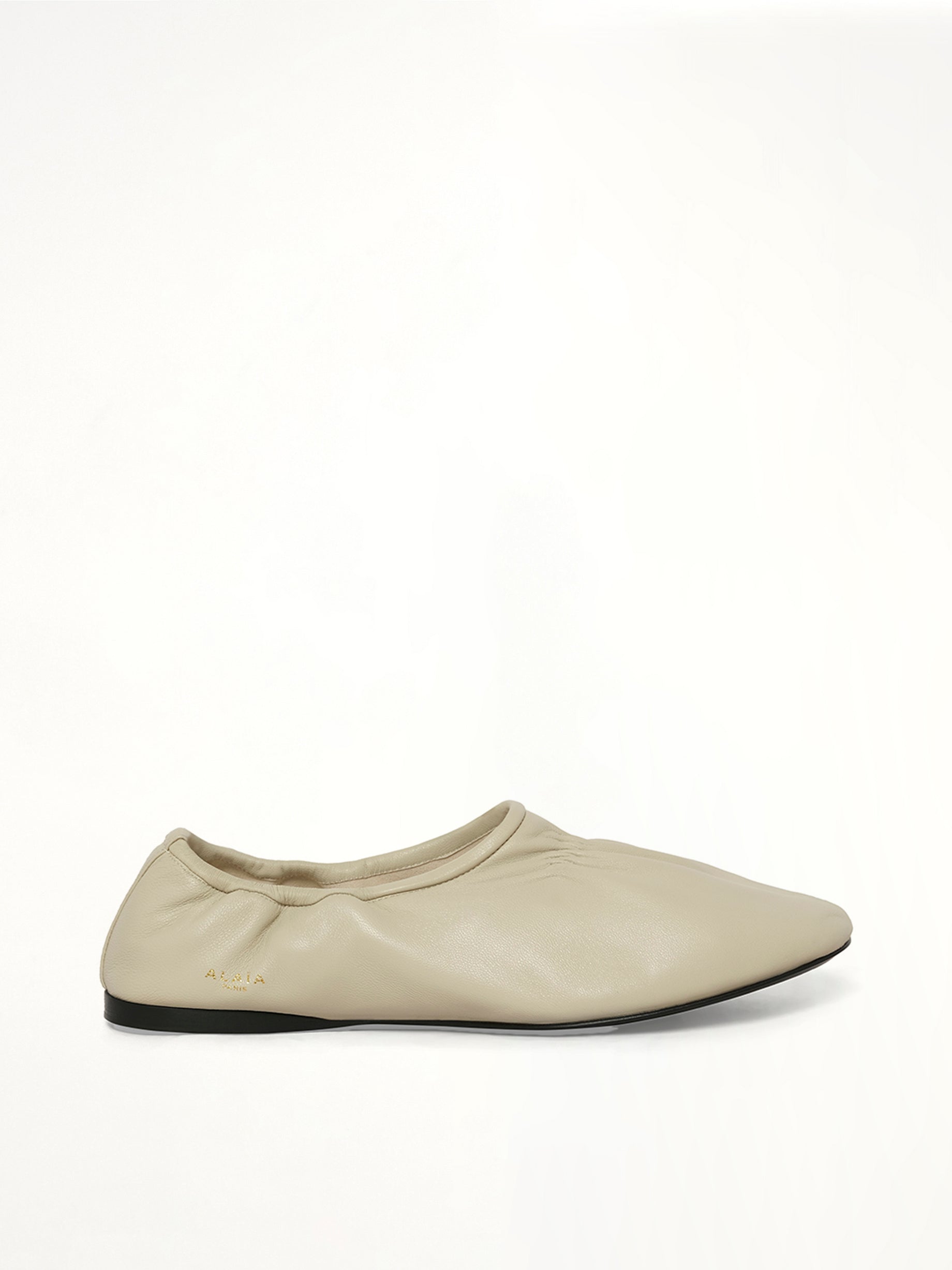 Supple Slippers in White Side View | ALAIA