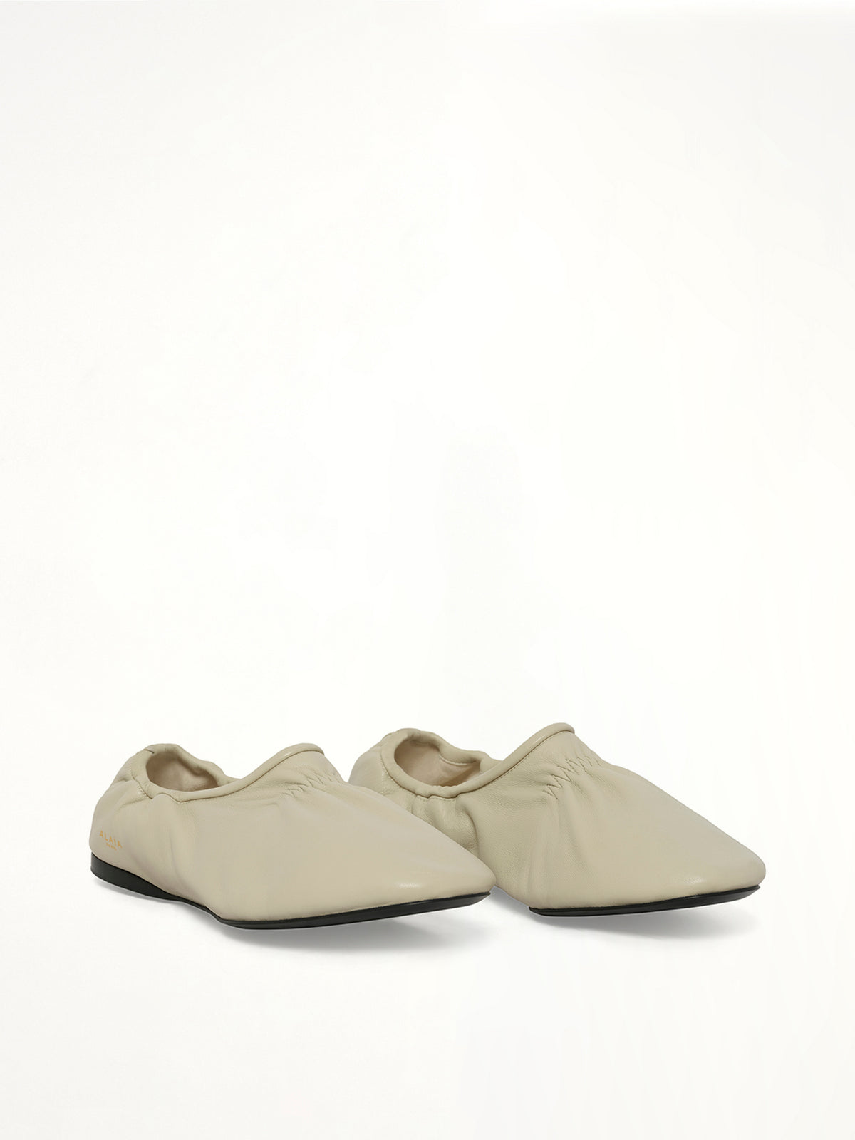 Supple Slippers in White Front View | ALAIA