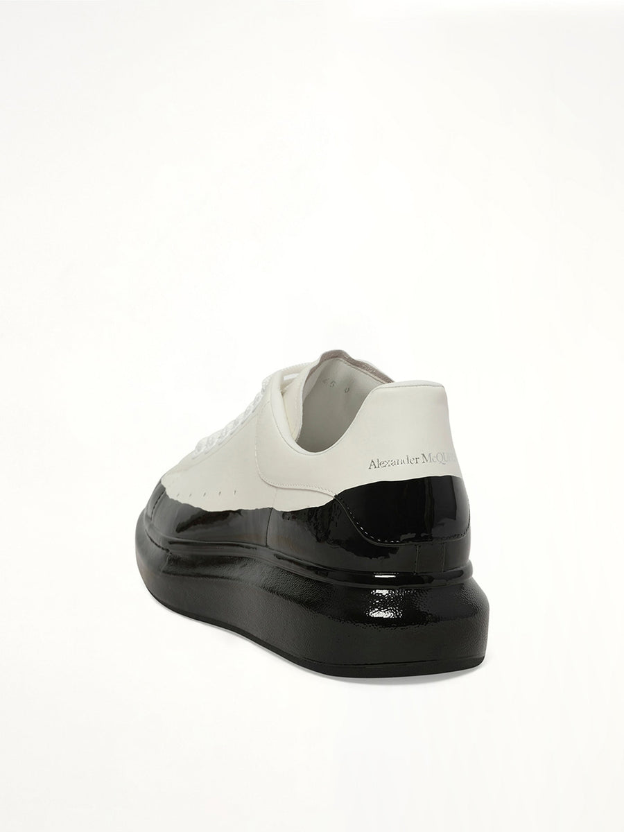 Larry Oversized Dipped Sneaker in White/Black Back View | ALEXANDER MCQUEEN