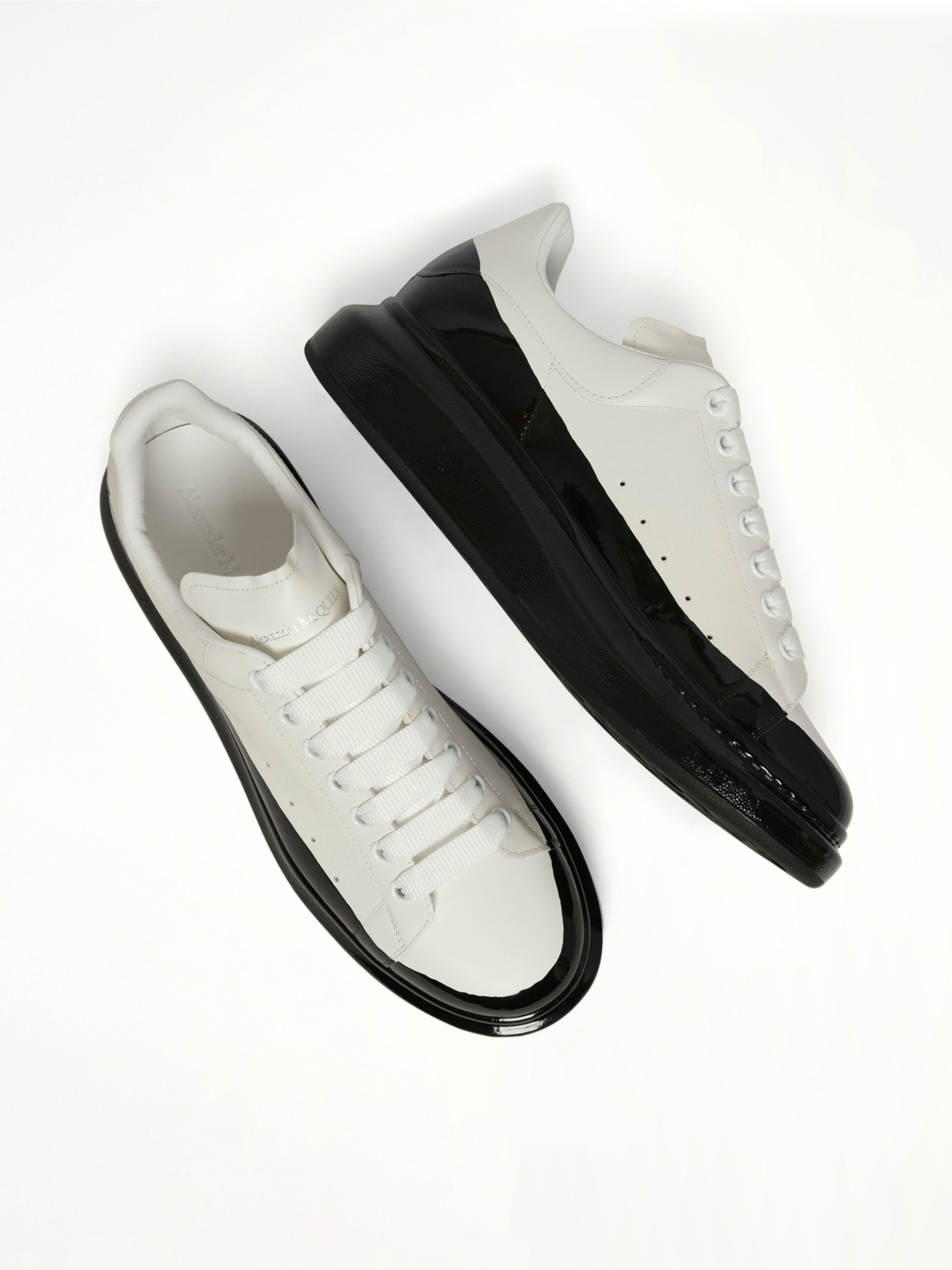 Larry Oversized Dipped Sneaker in White/Black Top View | ALEXANDER MCQUEEN