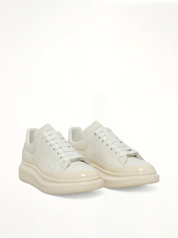 Larry Oversized Sneaker in White/Latte Front View | ALEXANDER MCQUEEN