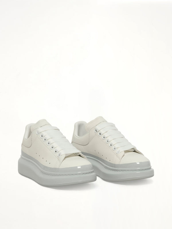 Womens Larry Oversized Sneaker in White/Ice Blue Front View | ALEXANDER MCQUEEN