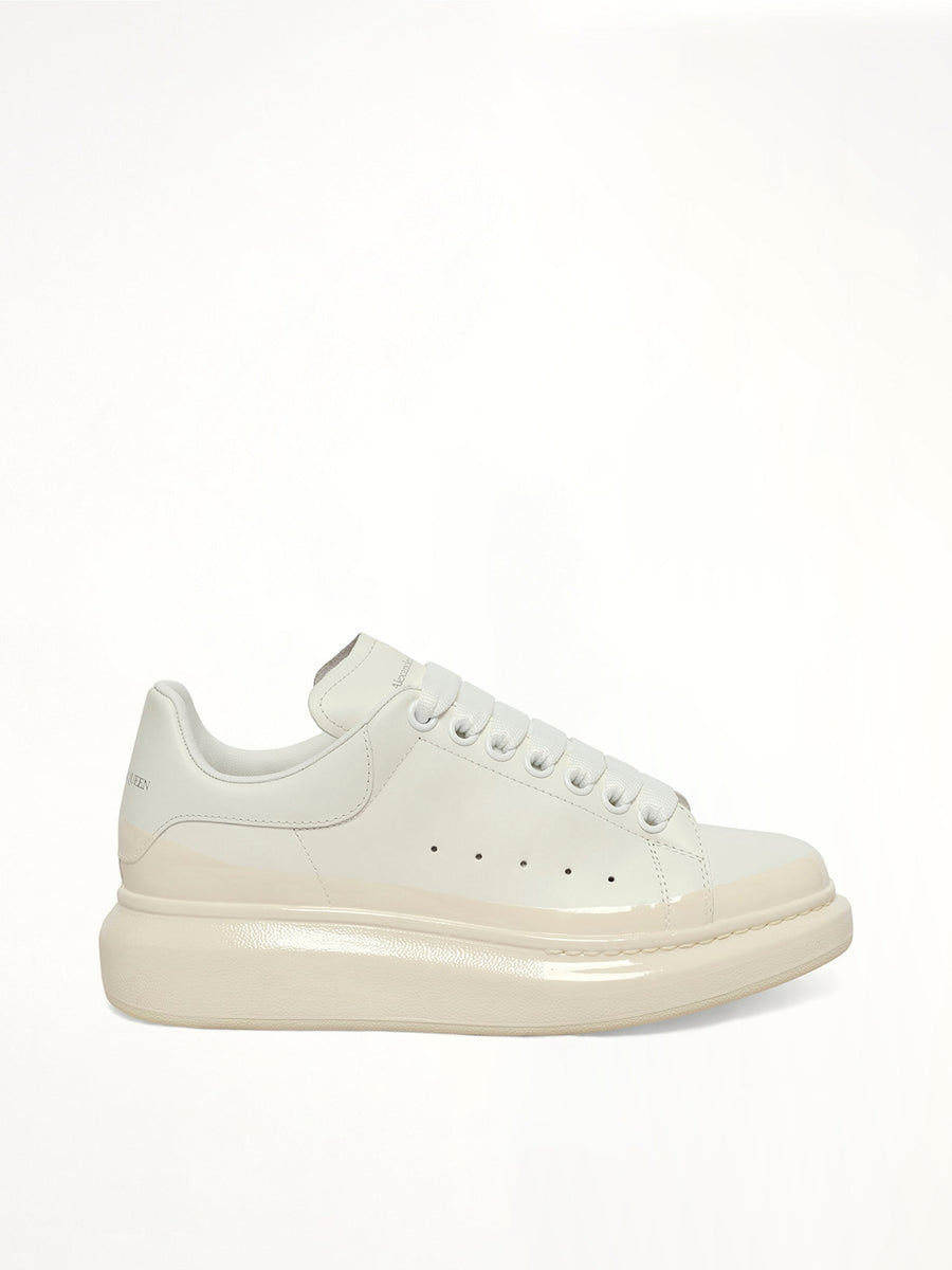 Womens Larry Oversized Sneaker in White/Tan Side View | ALEXANDER MCQUEEN