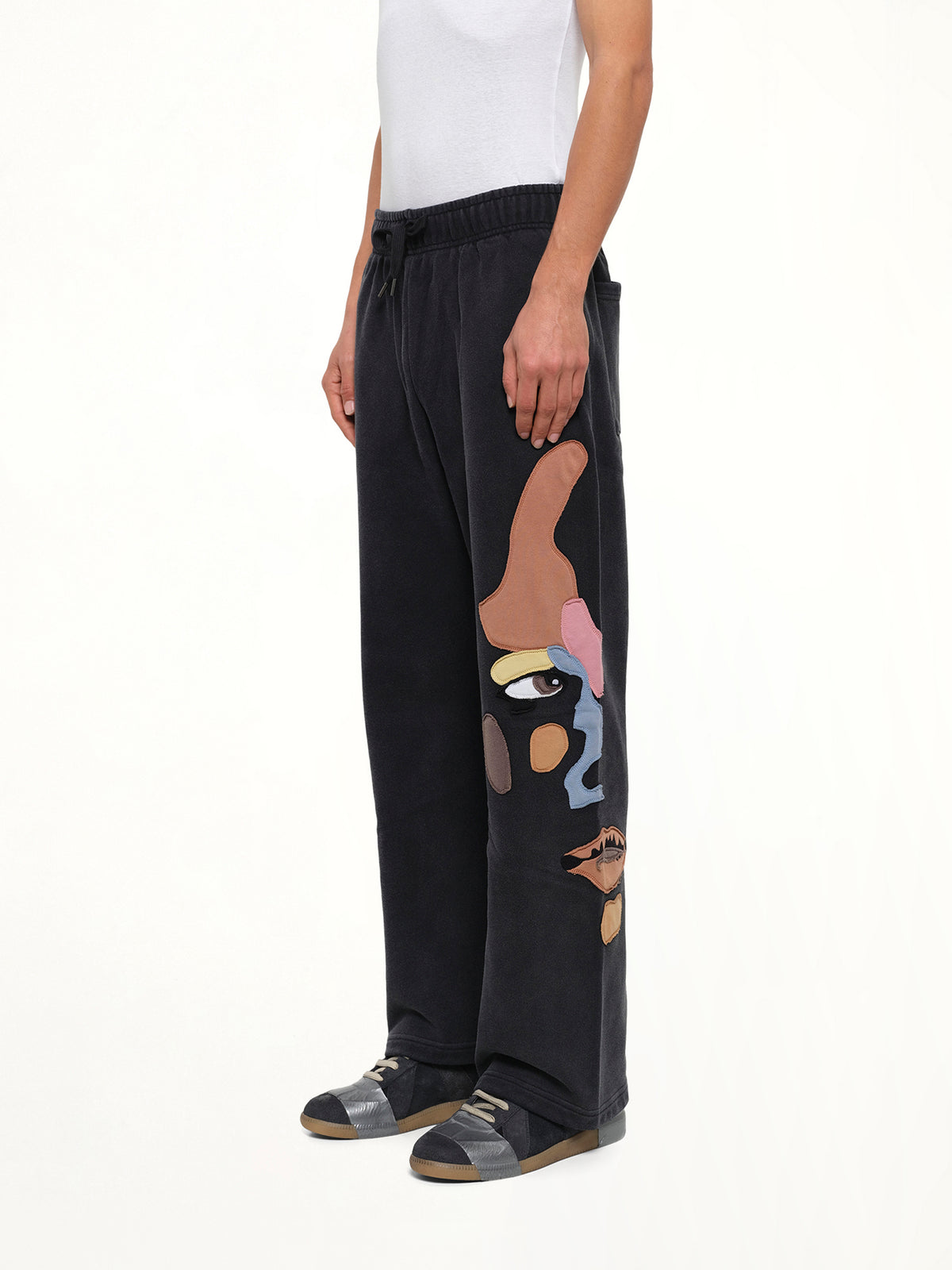 Side Eye Face Sweatpants in Black