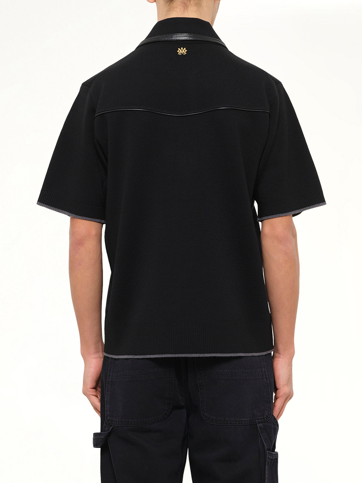 Leather Trim Knit Zipped Polo in Black