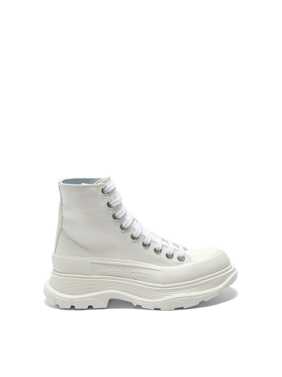 Tread Slick Canvas Lace-Up Boots in White Side View | ALEXANDER MCQUEEN