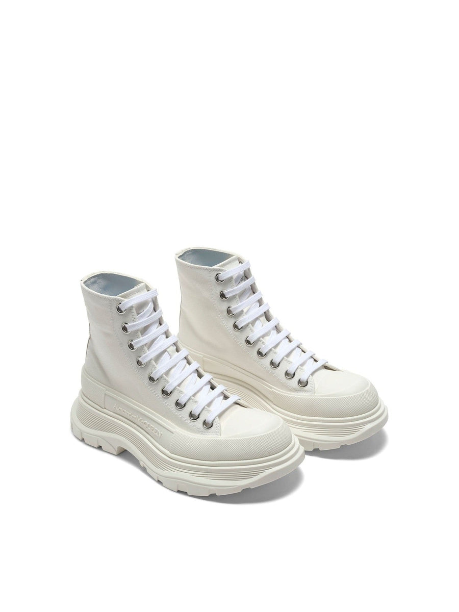 Tread Slick Canvas Lace-Up Boots in White Front View | ALEXANDER MCQUEEN