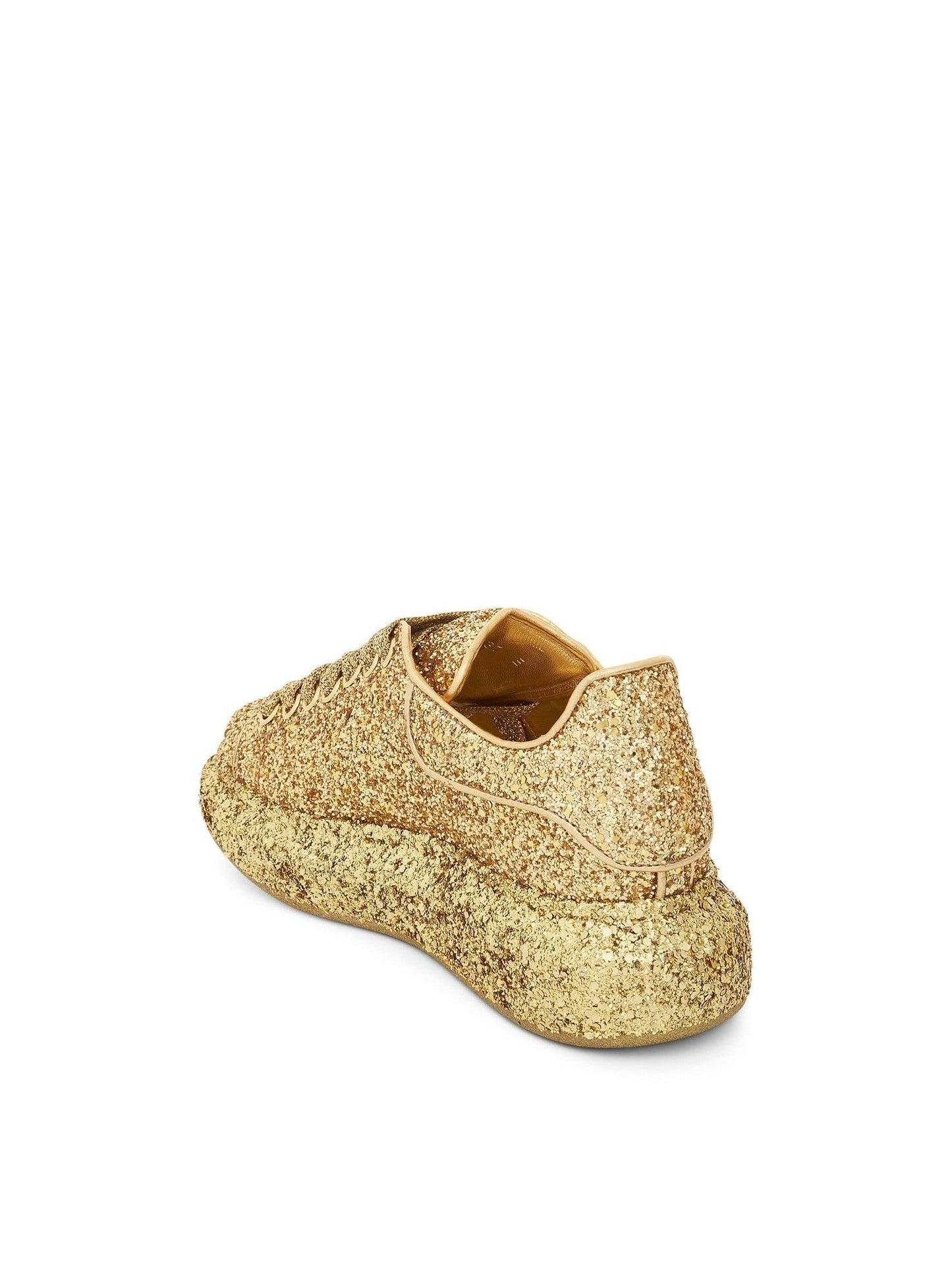 Larry Oversized Heel Glitter Sneaker in Gold